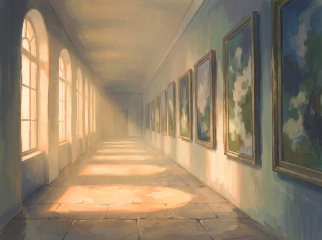 A long sunlit gallery corridor lined with framed artworks